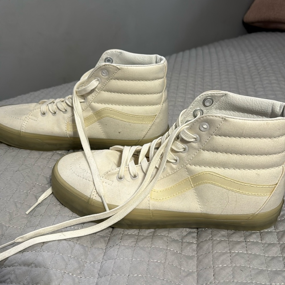 They have a yellow tint and more cream white